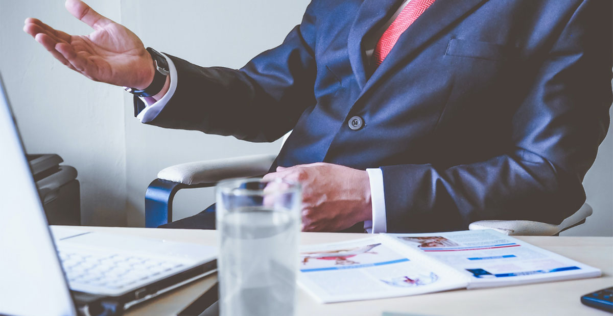 man-sitting-in-desk
